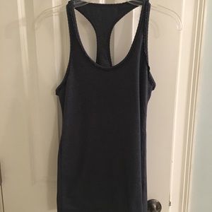 Lululemon graphite heather tank w/ ruffle trim.